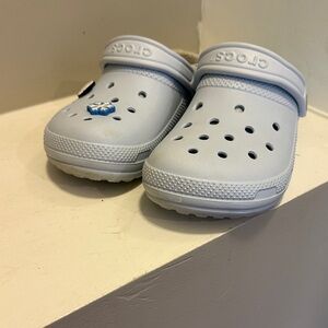 CROCS Sky Blue shoes with the furry inside